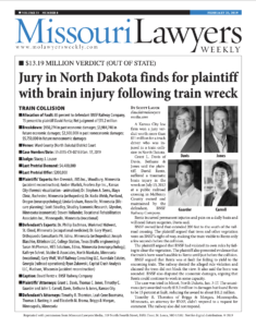A newspaper article titled "Missouri Lawyers Weekly" featuring a headline about a jury verdict in a North Dakota train collision case awarding $13.19 million to a plaintiff with a brain injury. The article includes images of individuals involved in the case.